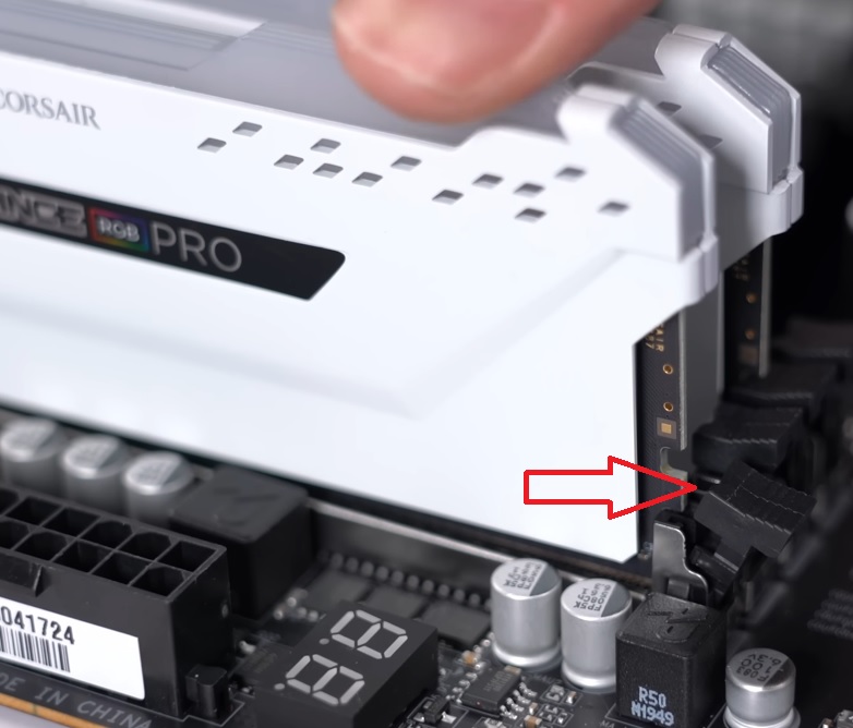 Place the RAM stick in the slot