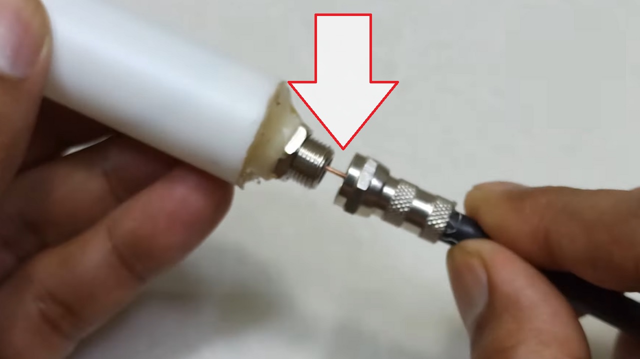 Connecting the other end of the cable to the newly made router antenna